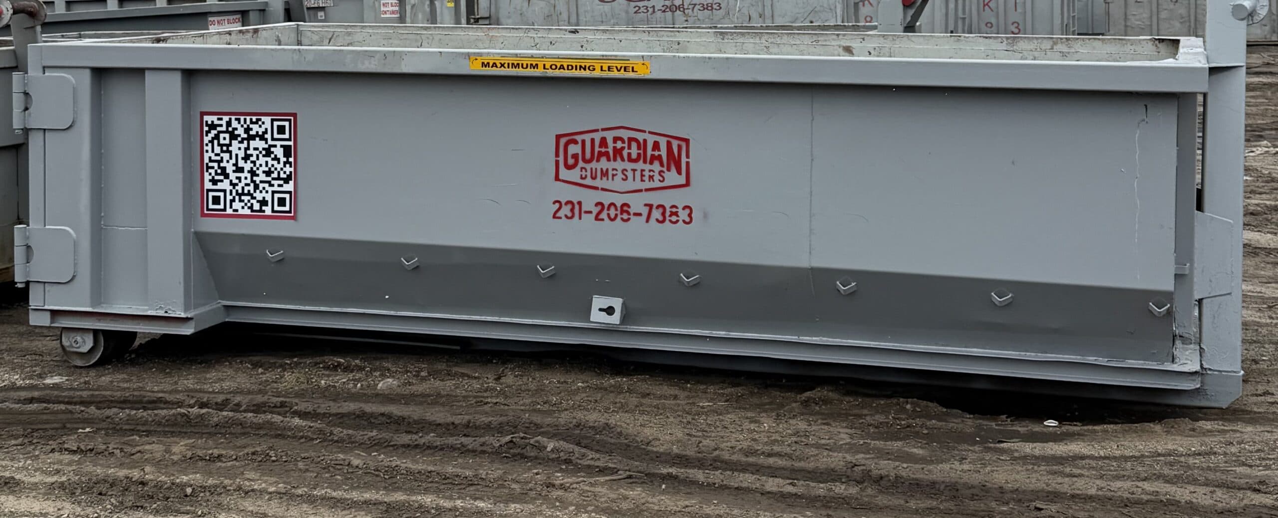 Guardian Dumpsters branded roll-off container